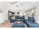 Bright living space with a large sofa and open to the kitchen and dining areas at 4227 Mackinnon Dr, Charlotte, NC 28214