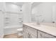 Clean bathroom with modern vanity, quartz countertop, and shower-tub combo at 5185 Grand Canyon Rd, Concord, NC 28027