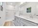 Modern bathroom with a double vanity, sleek cabinets, and a walk-in shower at 5185 Grand Canyon Rd, Concord, NC 28027