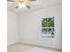 A simple bedroom with carpeted floor and a window to the exterior of the house at 5185 Grand Canyon Rd, Concord, NC 28027