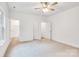 Bright and spacious bedroom with a ceiling fan, and adjoining bathroom and closet at 5185 Grand Canyon Rd, Concord, NC 28027