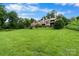 Townhomes feature backyard lawn space with wooden decks and staircases at 5192 Corbin Ln, Hickory, NC 28601