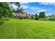 Townhomes feature backyard lawn space with wooden decks and staircases at 5192 Corbin Ln, Hickory, NC 28601