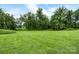 Expansive green lawn presents endless opportunities for recreational activities and outdoor enjoyment at 5192 Corbin Ln, Hickory, NC 28601