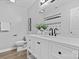 Bright bathroom with white vanity, white countertop and matte-black faucet fixtures at 5192 Corbin Ln, Hickory, NC 28601
