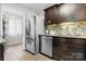 Contemporary kitchen with stainless steel appliances, granite countertops, and sleek wood cabinetry at 5192 Corbin Ln, Hickory, NC 28601