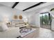 Bright living room with hardwood floors, decorative fireplace, and sliding glass doors to a outdoor area at 5192 Corbin Ln, Hickory, NC 28601