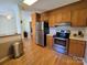 Efficient kitchen with stainless appliances, and wood cabinets providing storage space at 5238 Bethel Church Rd, Hickory, NC 28602