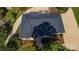 Aerial view of a brick home with a new roof, manicured landscaping, and an inviting driveway at 600 Queens Rd, Cherryville, NC 28021