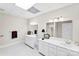 Basement bathroom features double sinks and vanity with tiled floors and a glass enclosed shower at 600 Queens Rd, Cherryville, NC 28021