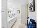 Well-lit bathroom featuring double vanity, neutral walls, and modern fixtures at 600 Queens Rd, Cherryville, NC 28021