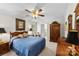 Bedroom featuring neutral walls, light-colored carpet, and wooden furniture at 600 Queens Rd, Cherryville, NC 28021