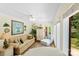 Cozy bedroom with seating area, natural light, and serene decor at 600 Queens Rd, Cherryville, NC 28021