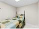 Small bedroom with neutral walls, and basic furnishings at 600 Queens Rd, Cherryville, NC 28021