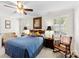 Relaxing bedroom with plush bedding, shuttered windows, and a comfortable sitting area at 600 Queens Rd, Cherryville, NC 28021
