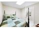 Small bedroom with neutral walls, and basic furnishings, next to a room with a water view at 600 Queens Rd, Cherryville, NC 28021