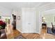 An inviting foyer with hardwood floors, white trim, and a view into other rooms of the house at 600 Queens Rd, Cherryville, NC 28021