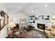 Inviting living room with fireplace, vaulted ceilings, and a cozy atmosphere at 600 Queens Rd, Cherryville, NC 28021