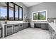 Bright kitchenette with stainless steel appliances, sleek countertops, and ample natural light at 6365 Ashton Park Dr, Denver, NC 28037