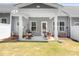 Covered patio with outdoor seating, perfect for relaxing and entertaining at 6365 Ashton Park Dr, Denver, NC 28037