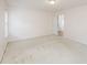 Spacious bedroom with neutral carpet flooring and lots of natural light at 6414 Goldenblush Cir, Charlotte, NC 28269