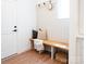Cozy entryway with a bench, coat hooks, and neutral decor at 6711 Creft Cir, Lake Park, NC 28079