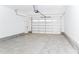 Spacious and clean two car garage with concrete floors and a white door at 6711 Creft Cir, Lake Park, NC 28079