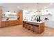 Spacious kitchen with a large center island, modern lighting, and wood cabinetry at 6711 Creft Cir, Lake Park, NC 28079