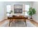 Stylish office space featuring a modern wood desk, and two large windows at 6711 Creft Cir, Lake Park, NC 28079