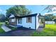 Well-manicured lawn and private driveway provide additional outdoor space at 703 Central Nw Dr, Concord, NC 28027
