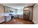 Modern kitchen features stainless steel appliances, light gray cabinets, and subway tile backsplash at 703 Central Nw Dr, Concord, NC 28027
