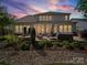 This home has a beautiful backyard patio with a fire pit and plenty of space for outdoor seating at 7150 Irongate Dr, Indian Land, SC 29707