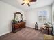 Comfortable bedroom featuring a ceiling fan, natural light, and decorative furnishings at 7150 Irongate Dr, Indian Land, SC 29707