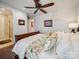 Cozy bedroom with decorative pillows and a peek into an attached bathroom at 7150 Irongate Dr, Indian Land, SC 29707