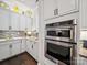 Elegant kitchen featuring modern appliances, stylish backsplash, and ample cabinet space at 7150 Irongate Dr, Indian Land, SC 29707