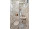 Charming powder room with stylish floral wallpaper, modern fixtures, and beautiful brass hardware at 726 E Kingston Ave, Charlotte, NC 28203
