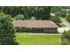 Aerial shot of single-story home showcasing the large lot, mature trees, and a detached garage at 900 Nance St, Kannapolis, NC 28083