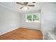 Bedroom with hardwood floors, a ceiling fan, and large window letting in plenty of natural light at 900 Nance St, Kannapolis, NC 28083