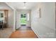 Inviting foyer with hardwood floors and natural light streaming through the front door at 900 Nance St, Kannapolis, NC 28083