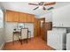 Laundry room with workspace, overhead storage cabinets and natural lighting provide a practical area at 900 Nance St, Kannapolis, NC 28083