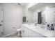 Bright bathroom features a double vanity, neutral color palette, and modern fixtures at 1010 Harry Ct, Albemarle, NC 28001