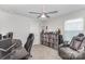 This room features carpet, a fan, and a collection of vinyl records at 1010 Harry Ct, Albemarle, NC 28001