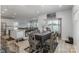 Bright dining area with modern table set and sliding glass door to outdoor space at 1010 Harry Ct, Albemarle, NC 28001