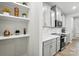 Modern kitchen with bright, stylish shelving on the wall at 11246 Bartrams Way, Charlotte, NC 28278