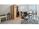 Office space with natural light, plush office chair, glass desk, and a contemporary sauna for relaxation at 11246 Bartrams Way, Charlotte, NC 28278