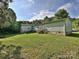 Large backyard featuring green lawn and a two-story home; perfect for outdoor relaxation at 1140 Randall Ct, Concord, NC 28025
