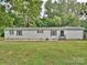 Well-maintained single-story home featuring charming shutters and a welcoming entrance at 1140 Randall Ct, Concord, NC 28025