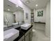 Bathroom with double sinks, granite countertop, and recessed lighting at 11419 Leadenhall Ln, Charlotte, NC 28262