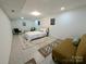 Cozy bedroom with neutral tones, decorative rugs, and a comfortable bed at 11419 Leadenhall Ln, Charlotte, NC 28262