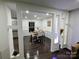 Dining room with hardwood floors and an open-concept design at 11419 Leadenhall Ln, Charlotte, NC 28262